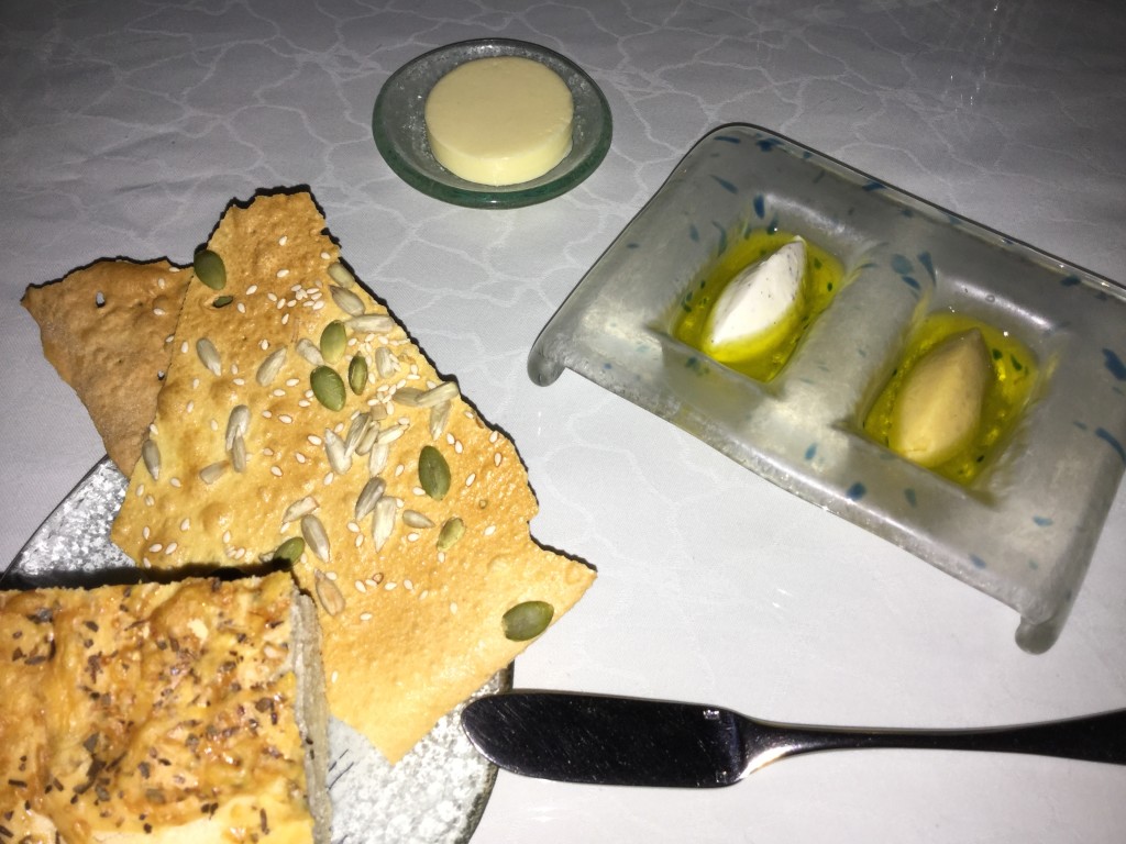 Assorted breads with flavoured hummus 