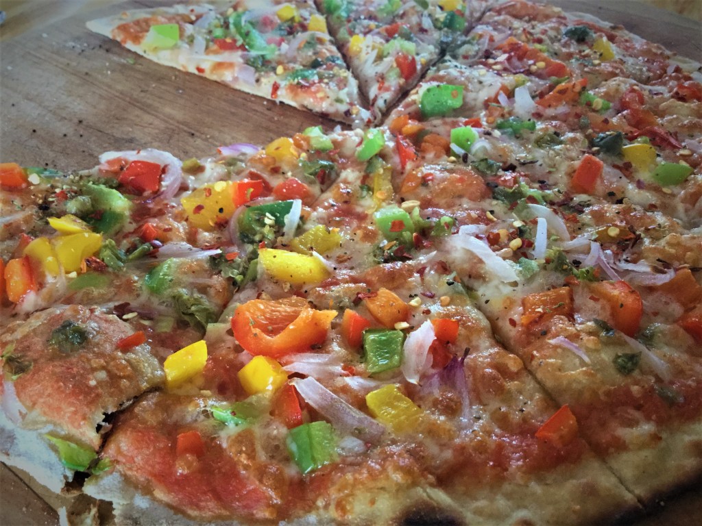 Open kitchen mushroom and bell pepper pizza