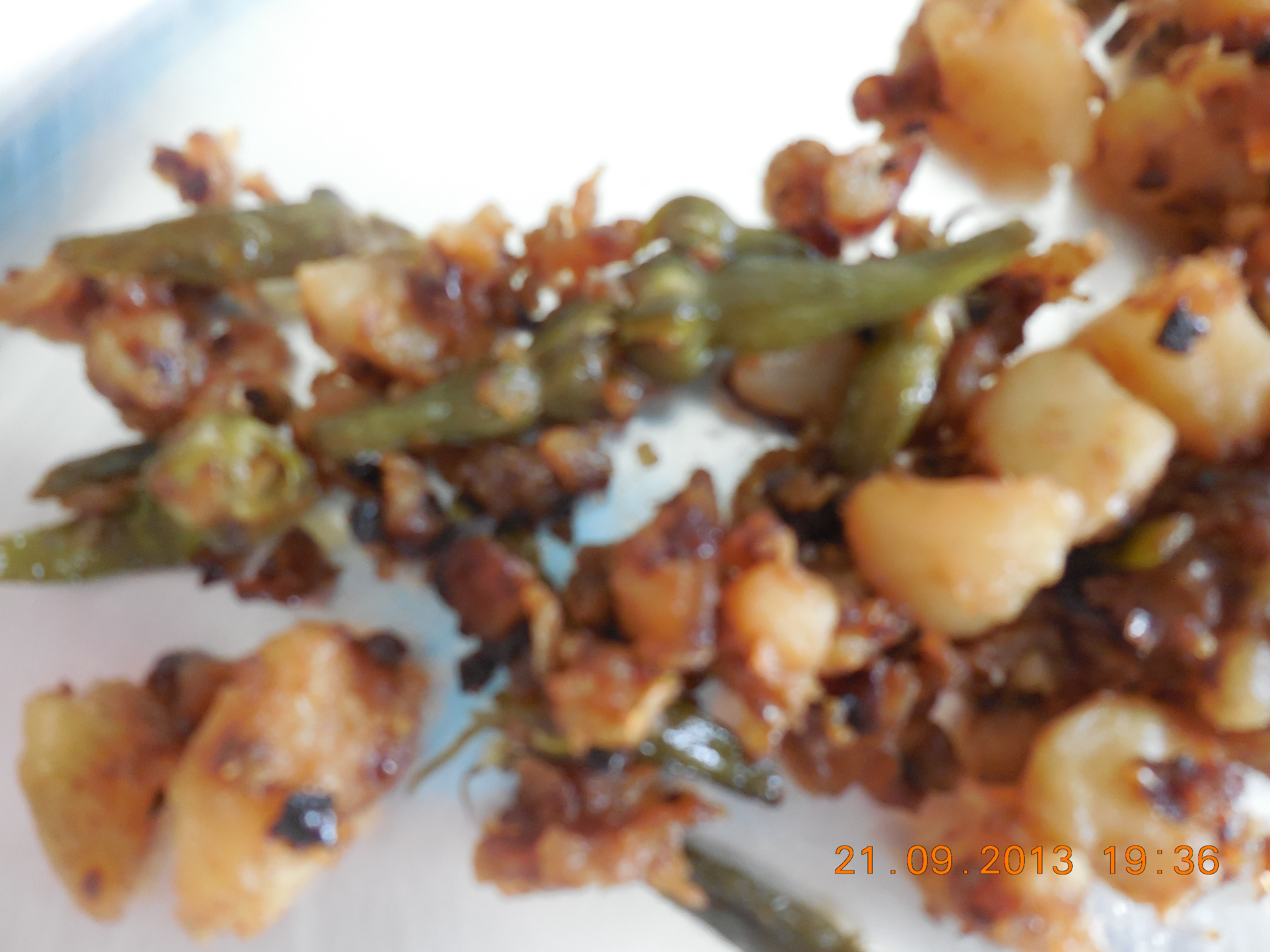 Potato poriyal with clove beans/kaambhu kathirikkai